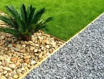 bg-front-yard-rock-landscaping-green-grass-768x514